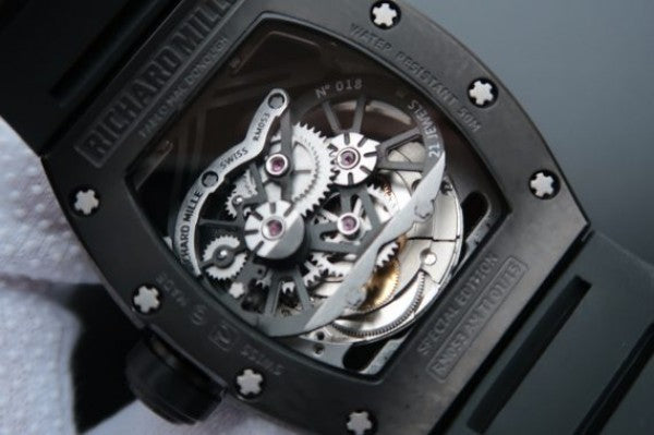 Replica Richard Mille RM053 PVD Fake Tourbillon Skeleton Dial Black Rubber Strap A2824